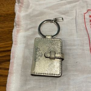 Gold metallic Coach keychain